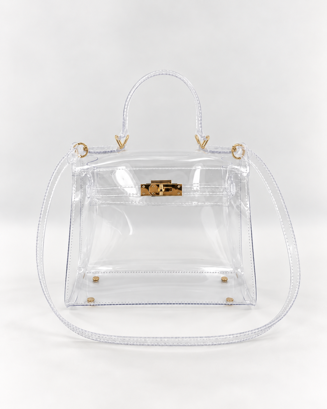 AuraX transparent PVC lock-buckle handbag with gold-tone hardware, front studio view