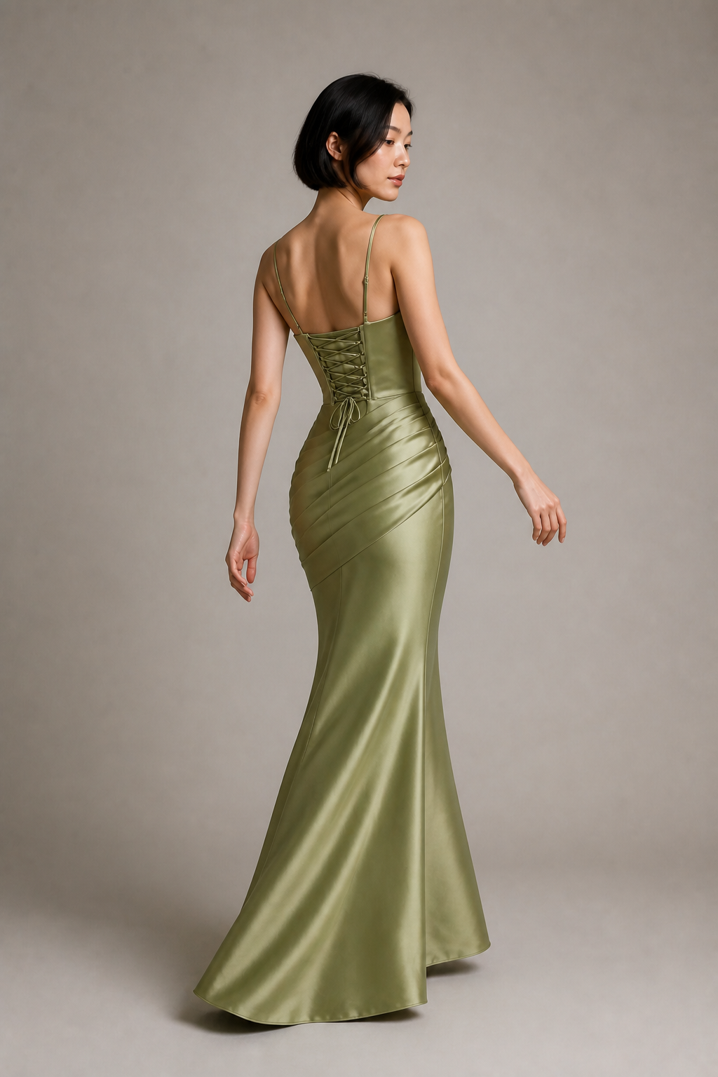 Green one-shoulder mermaid gown rear view