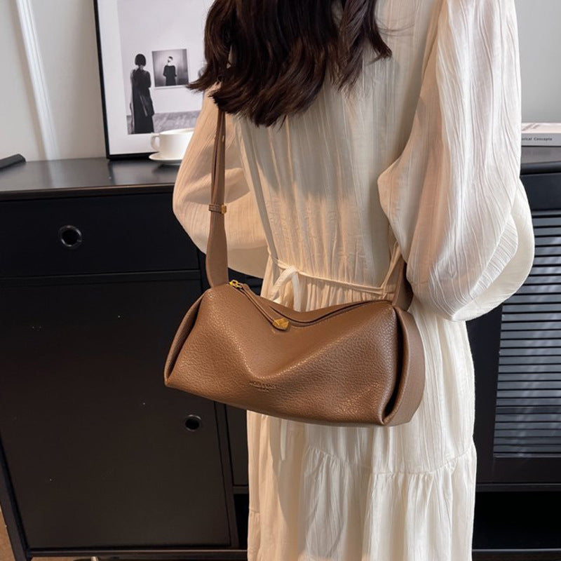 Brown pillow shoulder bag worn crossbody