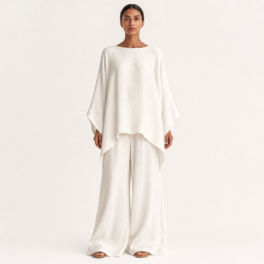 White cotton-linen pants and draped top set, front studio view