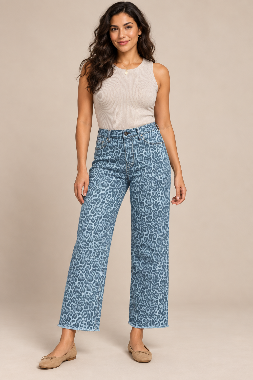 Woman wearing Sky Blue frayed-hem wide-leg jeans in a studio.