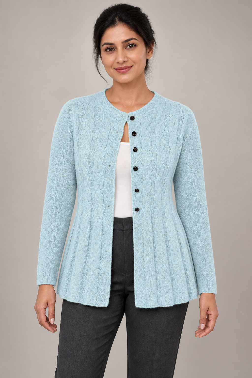 Women's blue knit cardigan studio view
