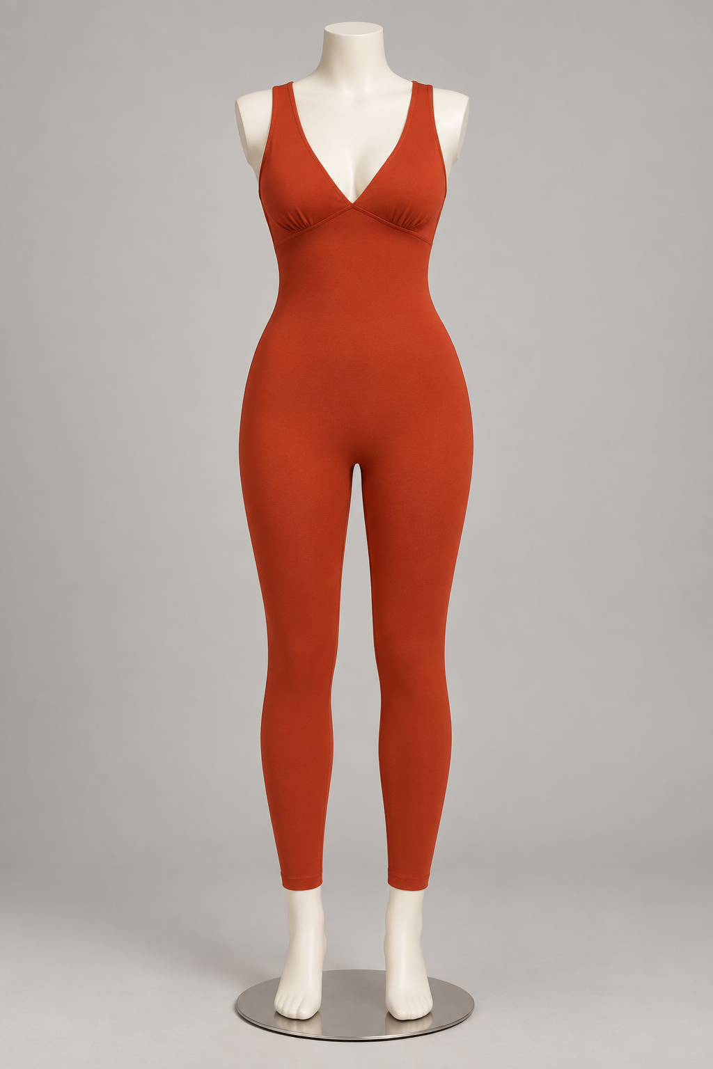 Women's Orange Red V-neck ankle-length yoga bodysuit displayed on a mannequin.