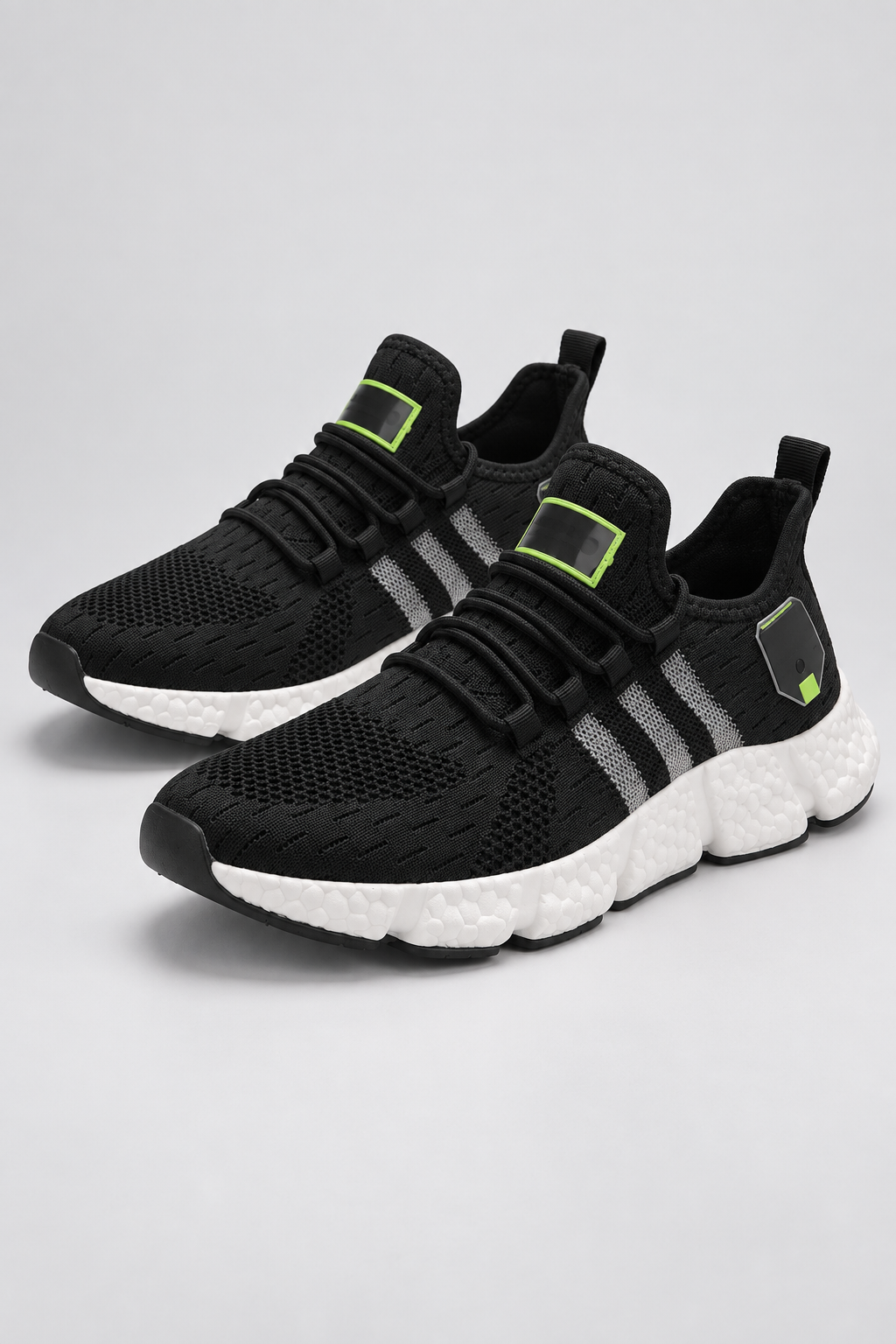 Men’s black and white knit lace-up sneakers with EVA sole studio view