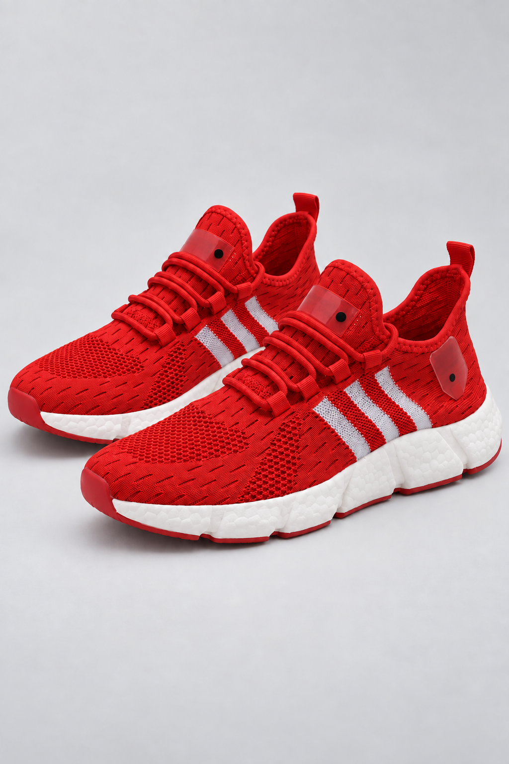 Men’s bright red knit lace-up sneakers with EVA sole studio view
