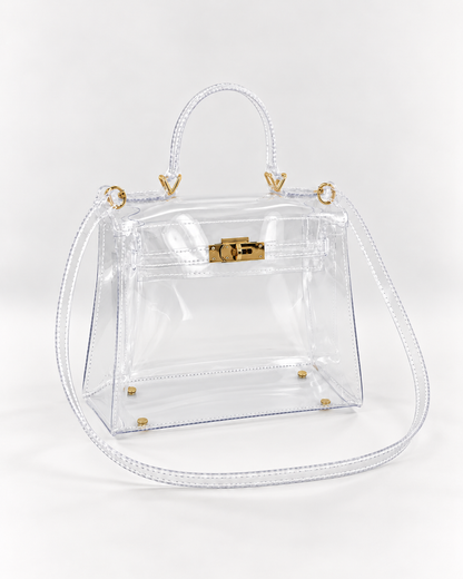 AuraX transparent PVC lock-buckle handbag with gold-tone hardware, three-quarter studio view