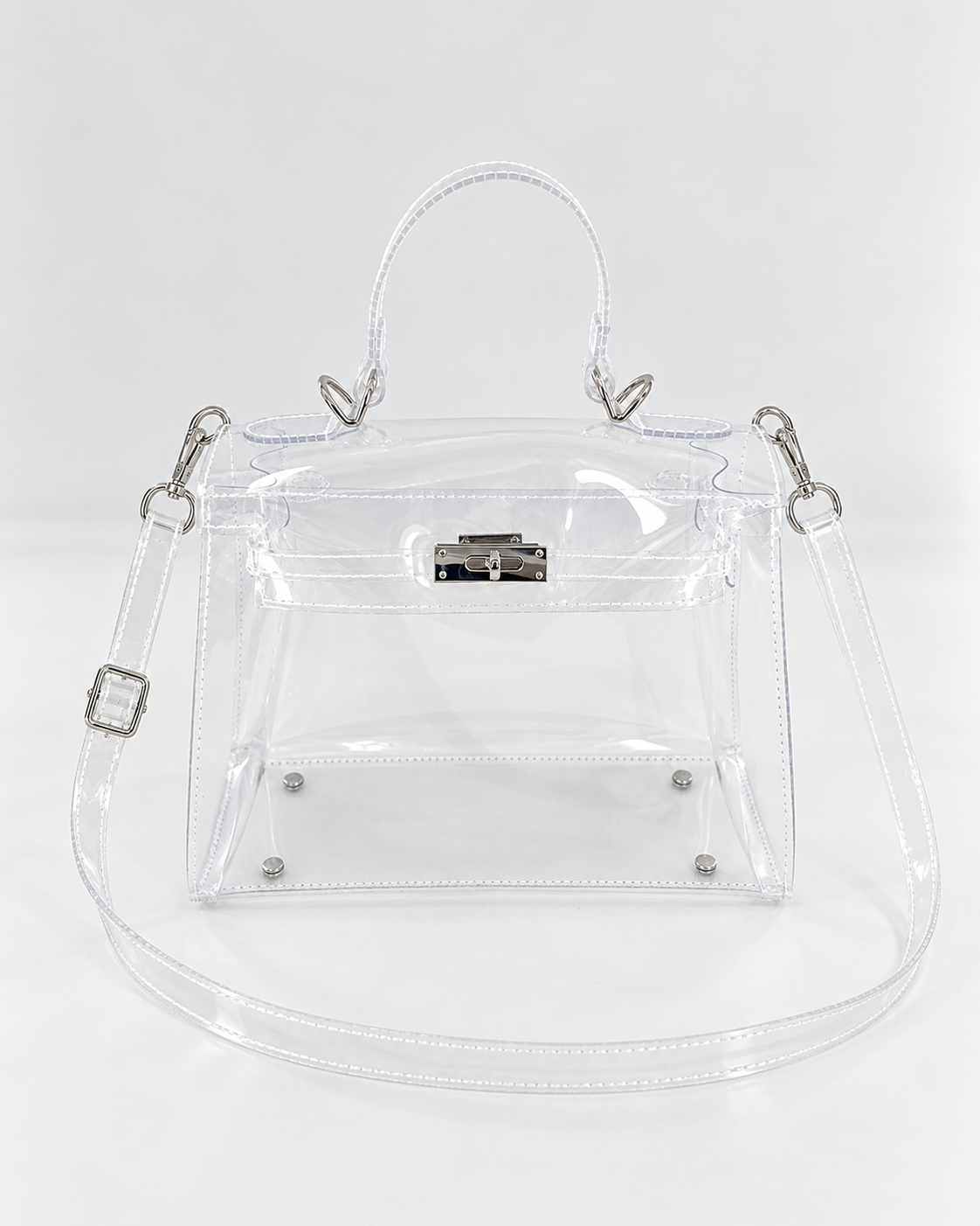 AuraX transparent PVC lock-buckle handbag with silver-tone hardware, front studio view