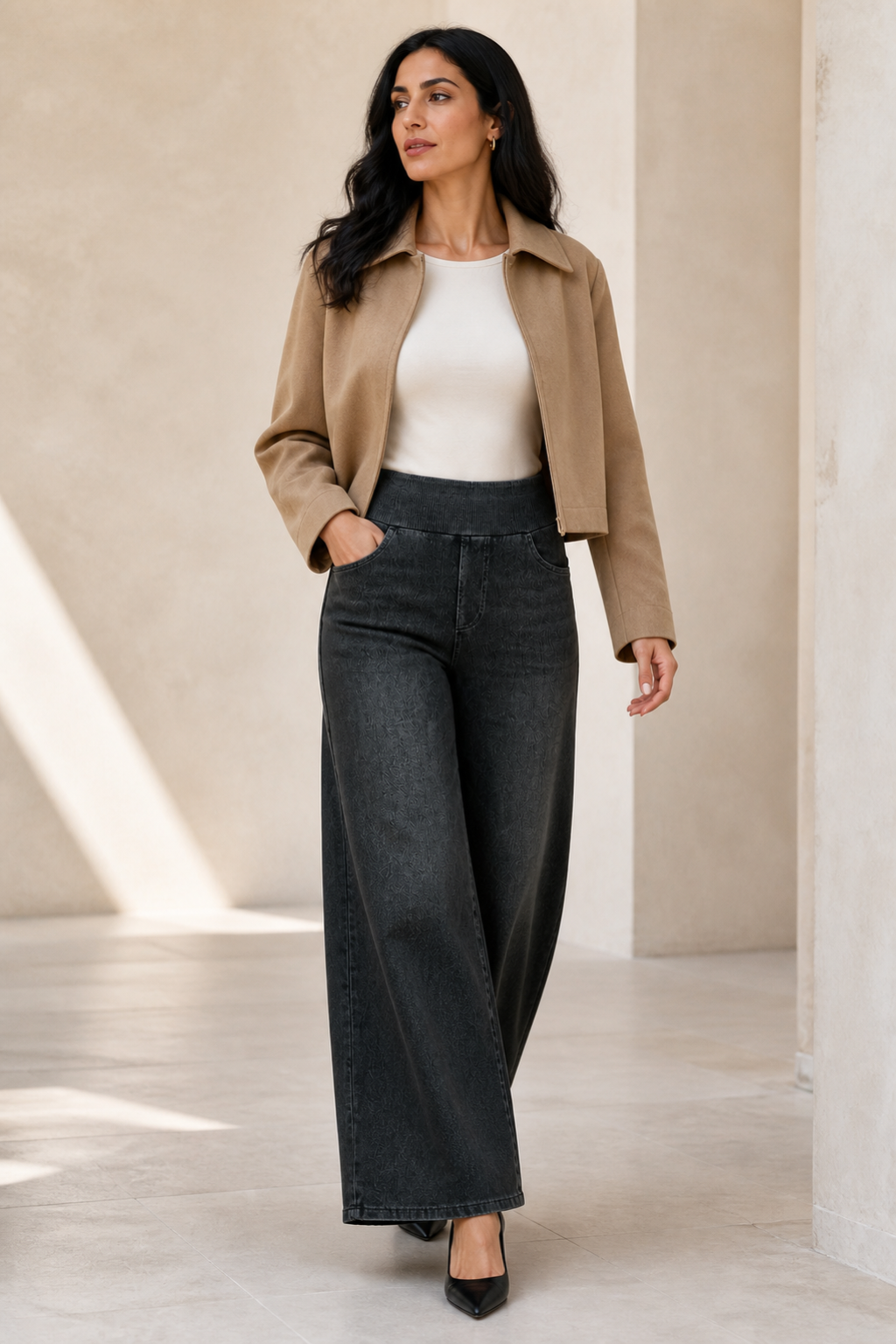 Model wearing AuraX high-waist wide-leg jeans in Extra Dark Grey Whisker Wash