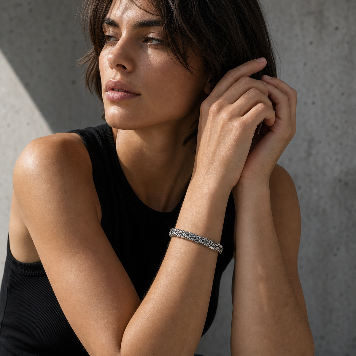 Model wearing Byzantine link titanium steel bracelet lifestyle photo