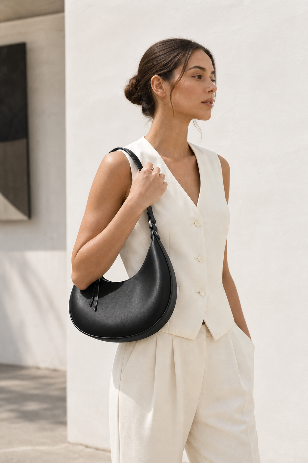 Black crescent moon shoulder bag lifestyle photo