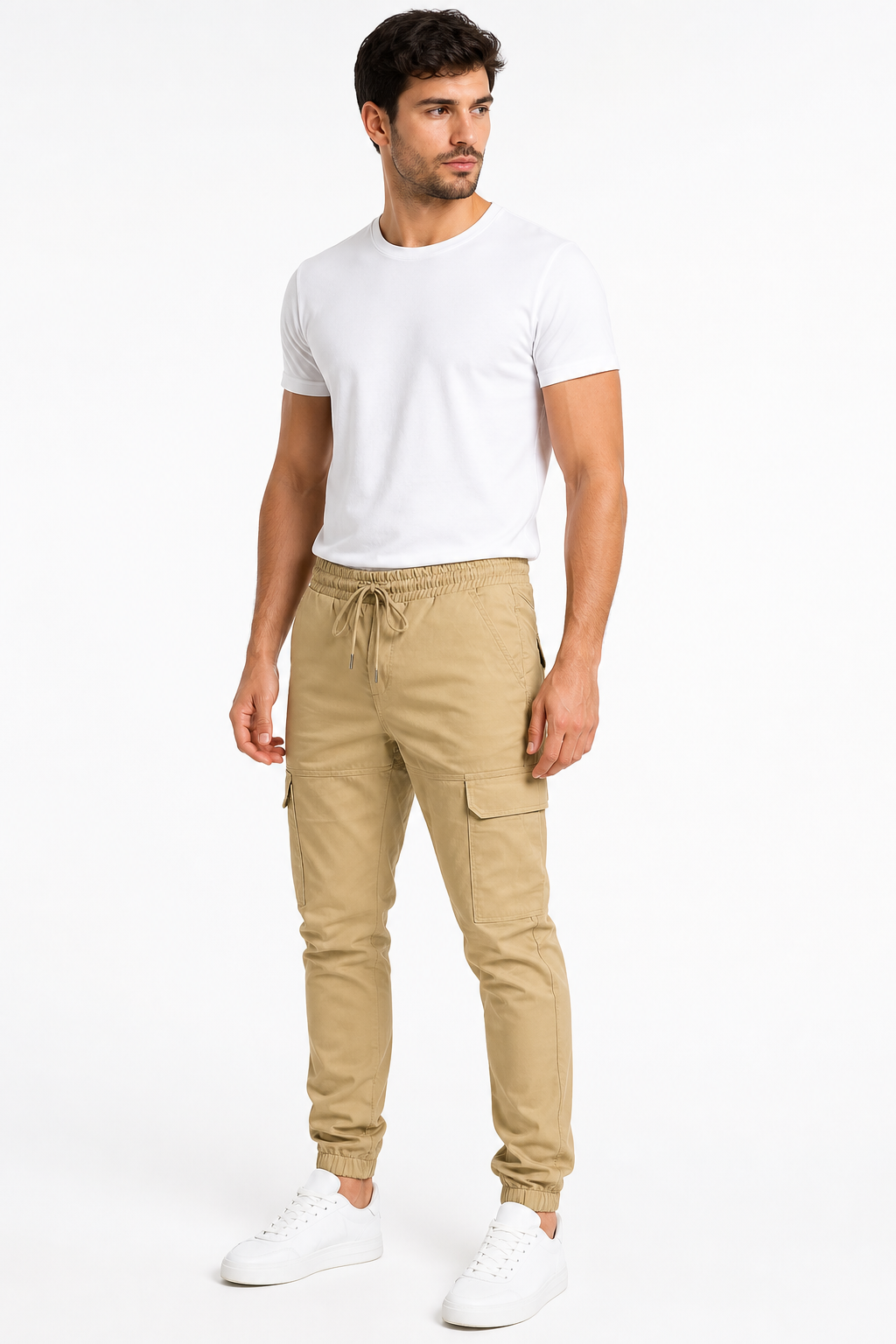 Male model wearing khaki cargo jogger trousers with drawstring waist and thigh flap pockets