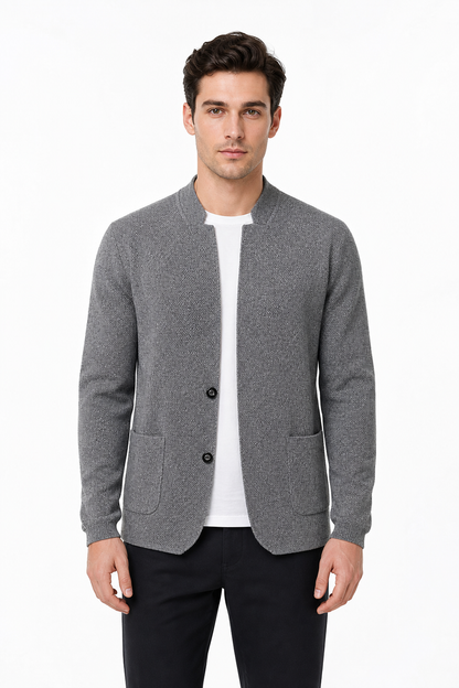 Male model wearing grey two-button knit cardigan jacket with front patch pockets
