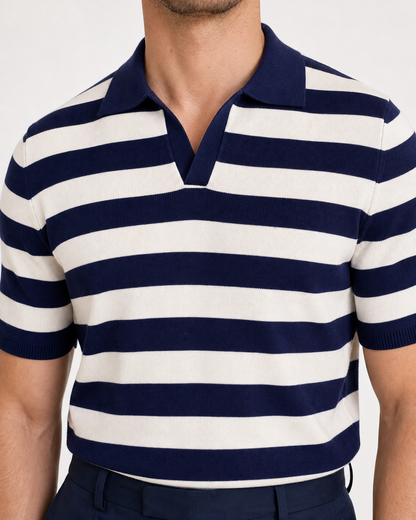 Close-up of navy and white striped short sleeve knit polo shirt collar and fabric