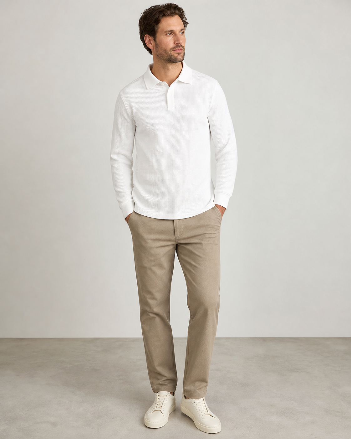Model wearing white men's waffle knit long sleeve polo shirt