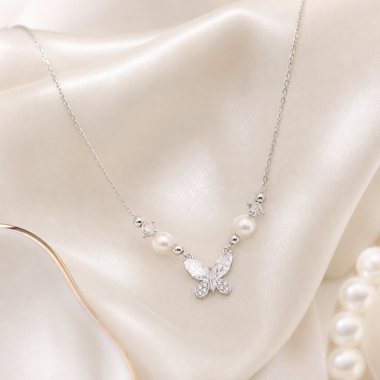 Silver butterfly pearl necklace product photo