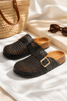 Premium product image of Women's Transparent PVC Crystal Slide Mules in a resort-inspired setting